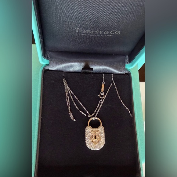 Tiffany & Co. Jewelry - Tiffany&Co. Vintage Lock Pendant, Platinum and 18 K with round brilliant .
